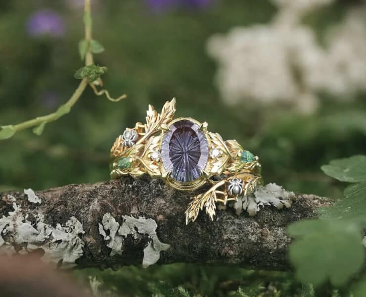 Non-traditional ring pictured in a garden setting